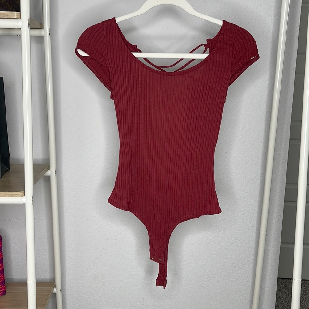 NWT ribbed body suit size large, open back detail